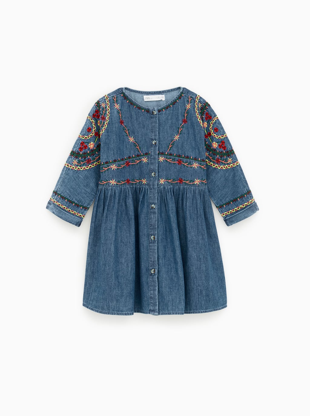 Vestido denim con bordados de Zara Kids: 22,95 euros.