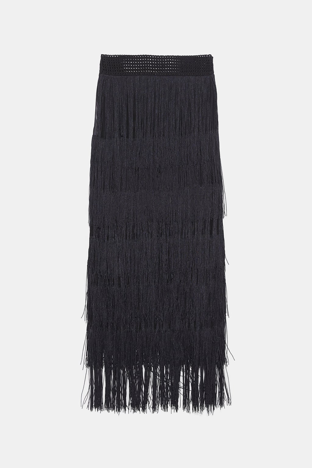 Falda larga con flecos: 39,95 euros.