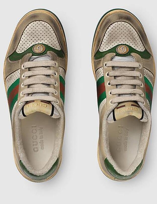 El modelo de zapatillas Screener de Gucci parece que están sucias.
