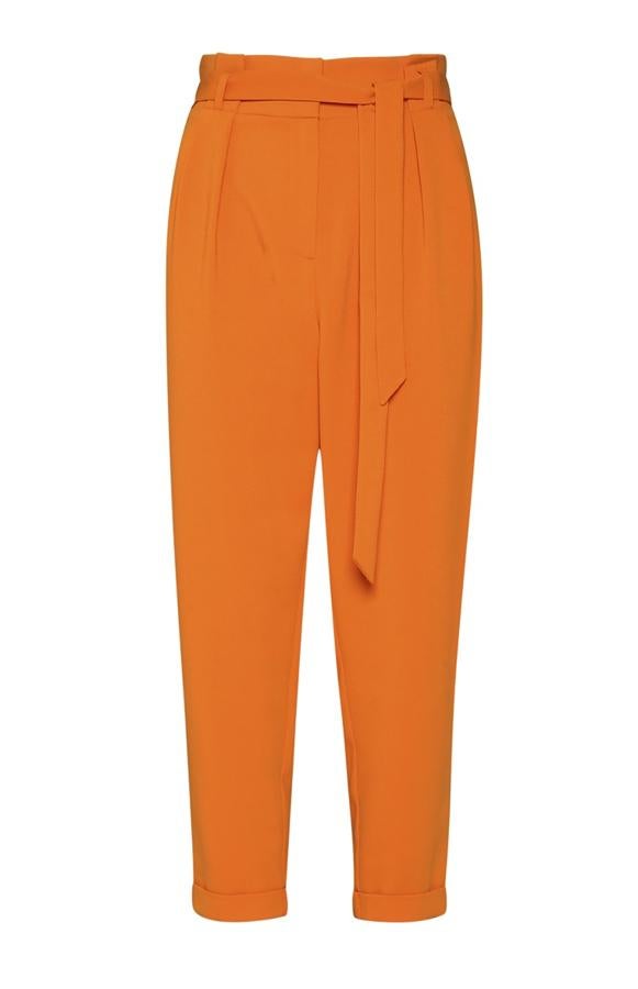 Pantalón en color naranja con detalle de lazo, 16 euros.