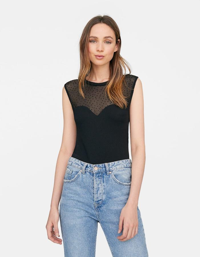 Body de tul con detalle de topos, 15,99 euros.