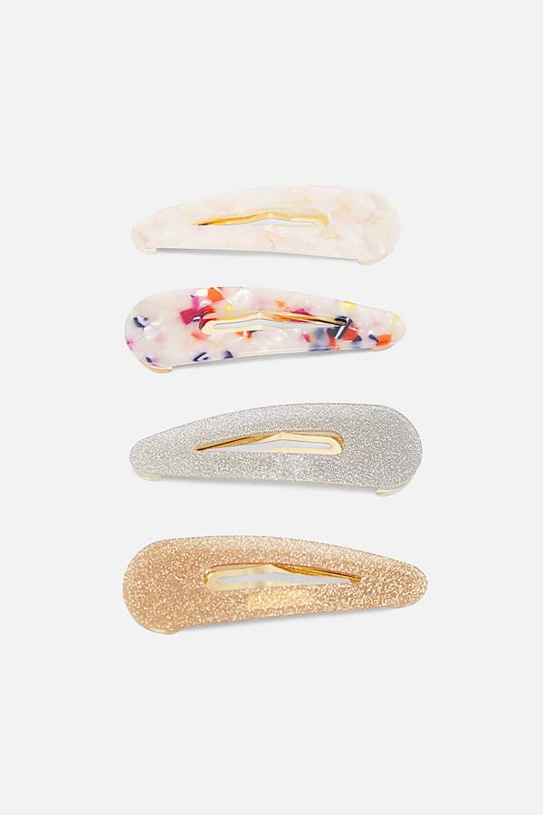 Si eres más del formato clip, estas de resina en diferentes tonos son las tuyas. Y te puedes comprar más de un paquete para alternarlas como quieras. Son 9,95 euros.