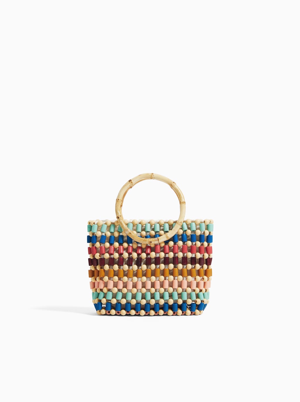 Bolso formato bandolera multicolor de cuentas: 17,95 euros en Zara Kids. Alto x Ancho x Fondo 15 x 23 x 7,5 cm.