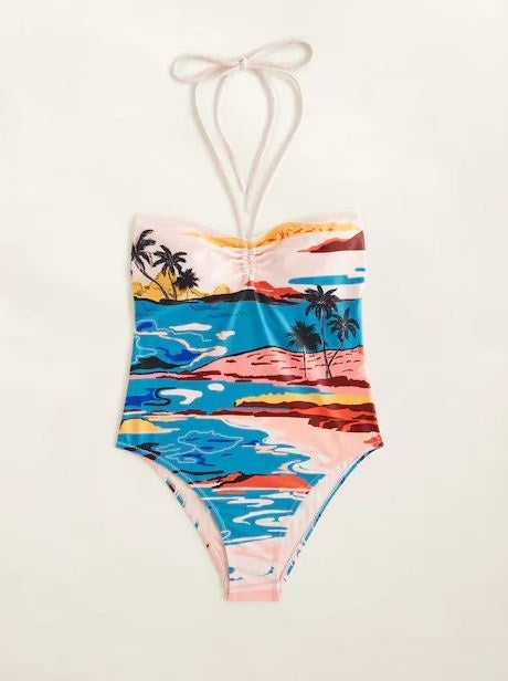 Si no puedes viajar a Hawái, que Hawái venga a ti. Bañador con escote recto, fruncido y atado al cuello. (35,99 euros).