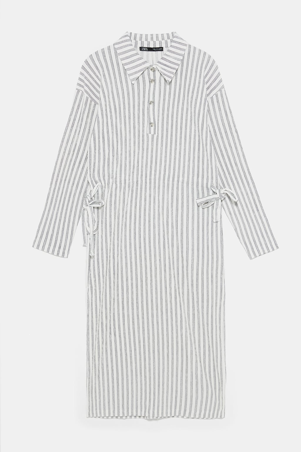 Vestido camisero con lazos en los laterales. (25,95 euros).