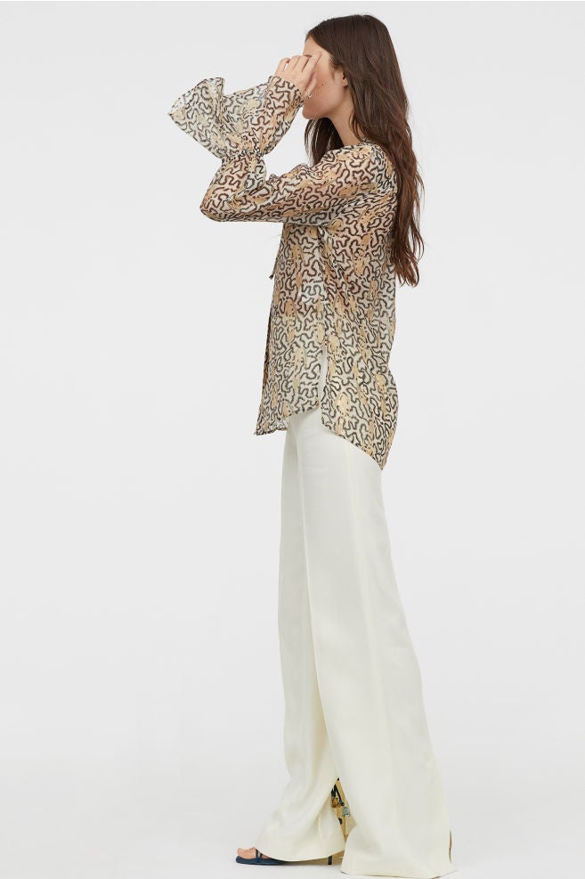 Blusa con estampado retro de H&M. (59,99 euros).