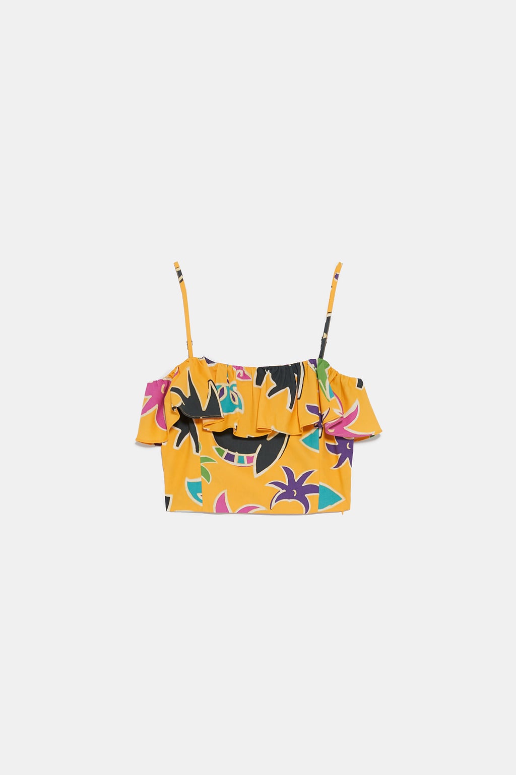 Top corto con estampado multicolor y volante: 9,99 euros en Zara.