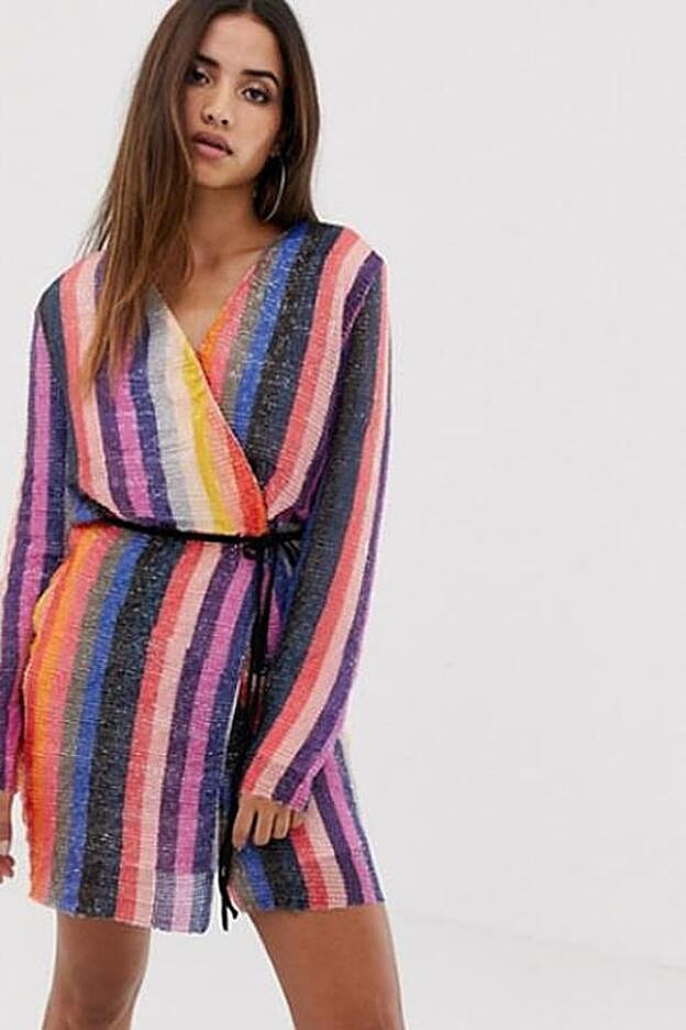 Minivestido de lentejuelas con diseño cruzado a rayas de Club L, 43,99 euros.