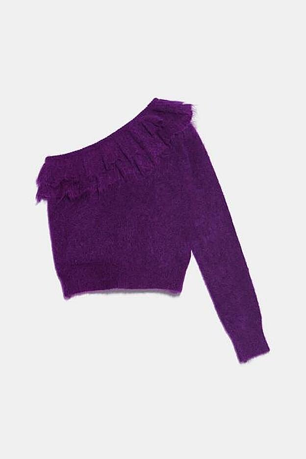 Detalle del jersey de Zara que lleva Rocío Osorno, en el que se puede apreciar perfectamente el largo a la cintura.