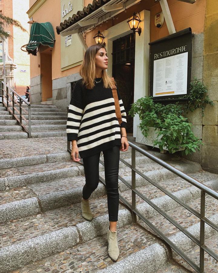 Mery Turiel ha compartido  sus botines cowboy favoritos . Son este modelo de Mango que ha combinado, en este caso, con pitillos negros y jersey de Zara.