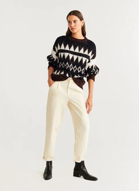 Jersey de rombos combinado con lentejuelas. ¡Pura elegancia! (39,99 euros). De Mango.