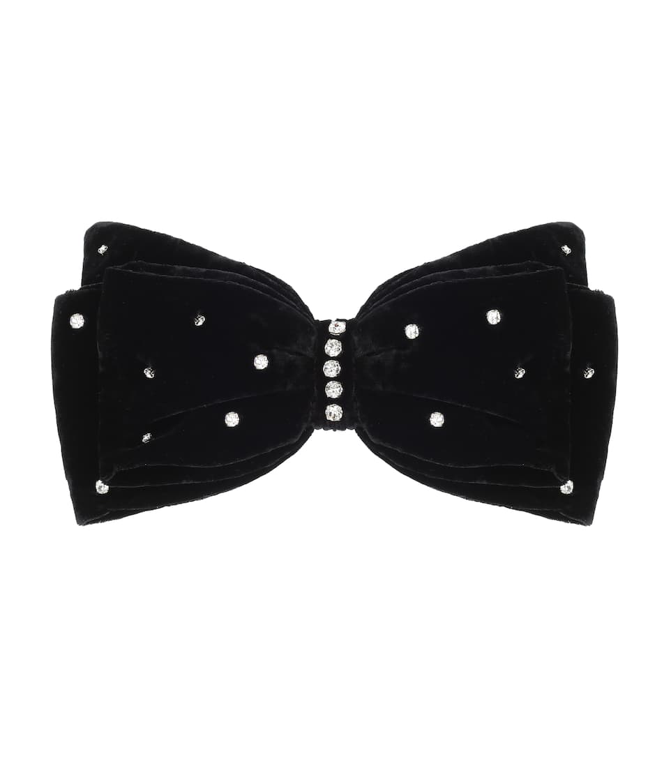 Pasador lazo de terciopelo con brillos de Miu Miu. (250 euros).