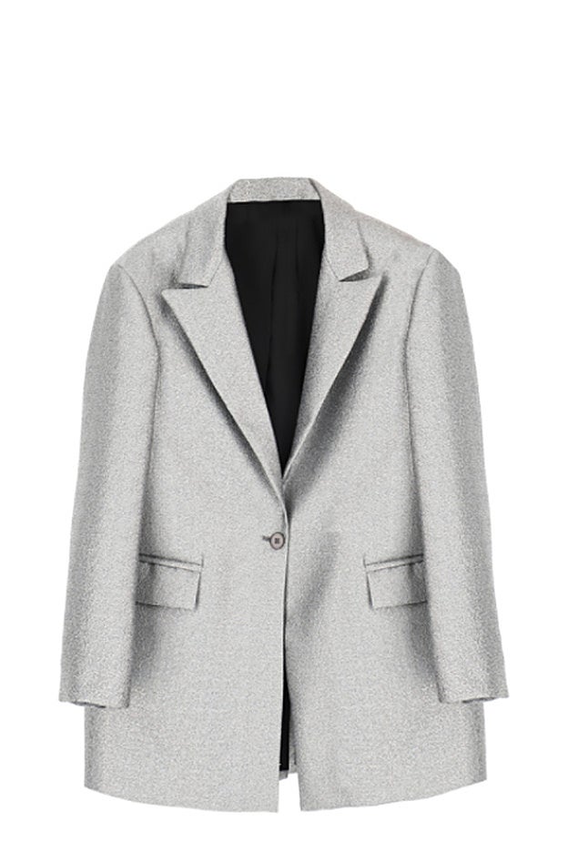 La chaqueta que lleva Dulceida como vestido es el look de Nochevieja perfecto.