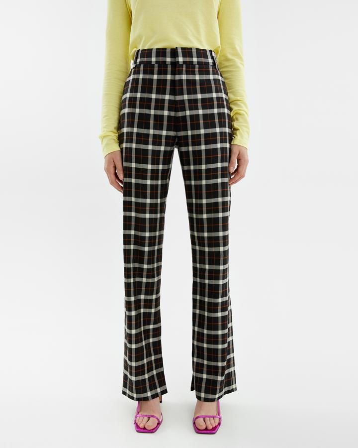 Pantalón recto de estampado de cuadros de Bimba y Lola (94 euros).