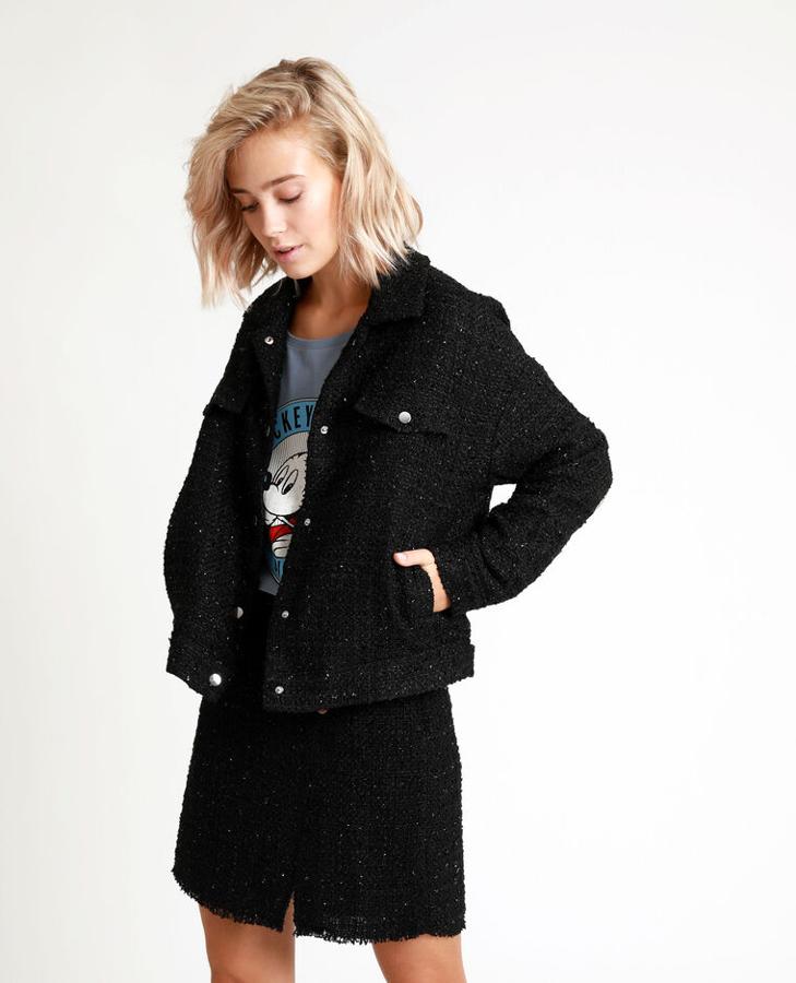 Chaqueta de tweed negra y gris de Pimkie. Costaba 39,99 euros y está rebajada a 20 euros.