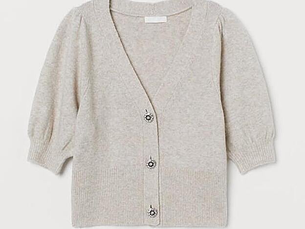 Este cárdigan corto es compatible tanto con un look sofisticado como con uno de sport