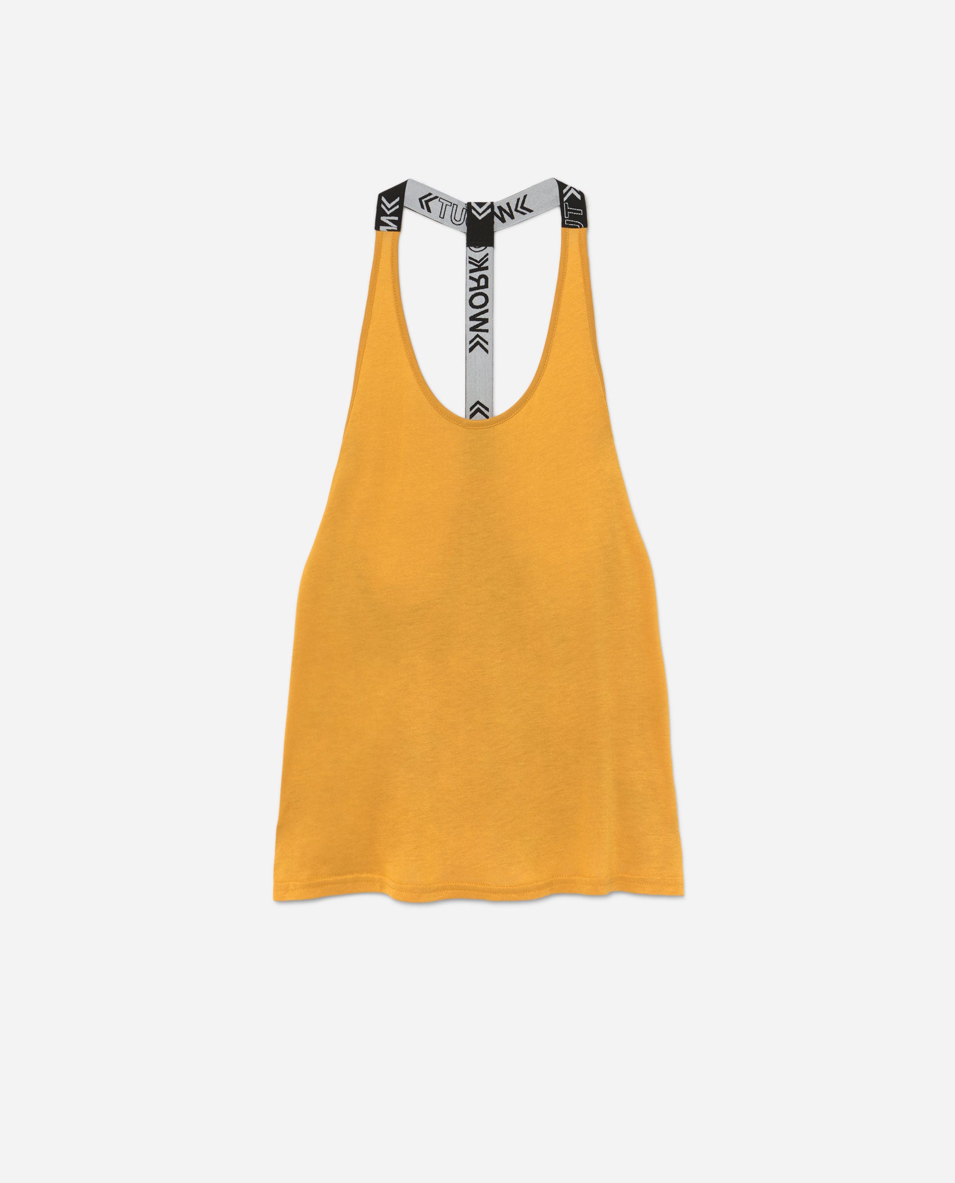 Camiseta de tirantes en tono amarillo curry. De Lefties. (7,99 euros).