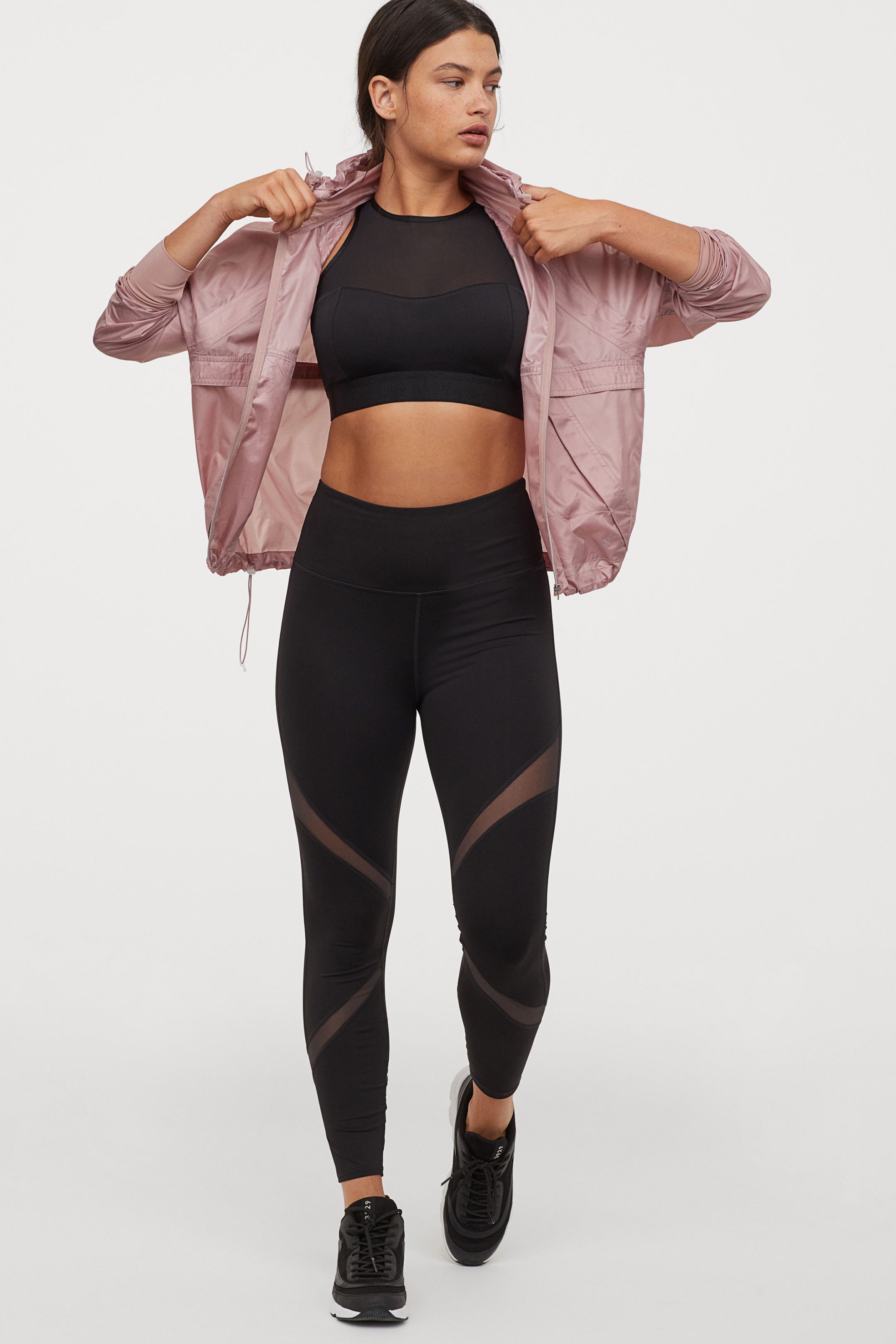 Mallas de deporte High Waist con detalles semitransparentes. (24,99 euros). En H&M.