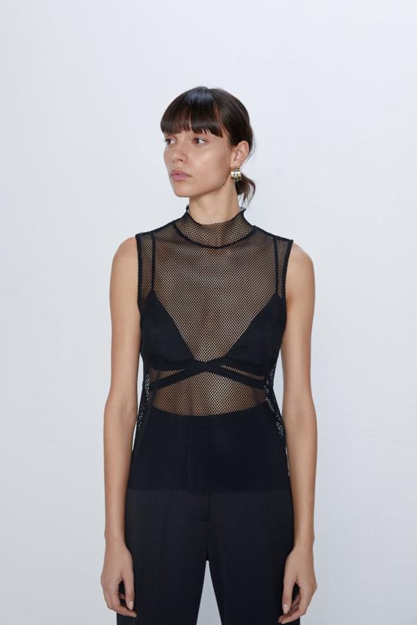 Camiseta de manga sisa de red semitransparente en color negro 9,95 euros).