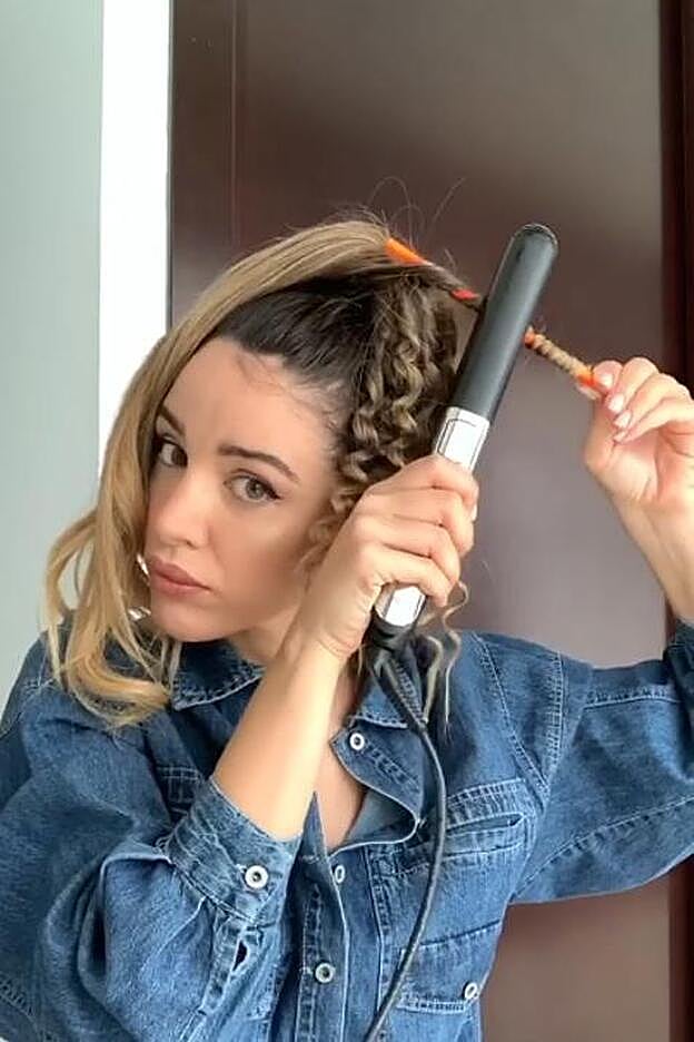 Teresa y el lápiz rizador.