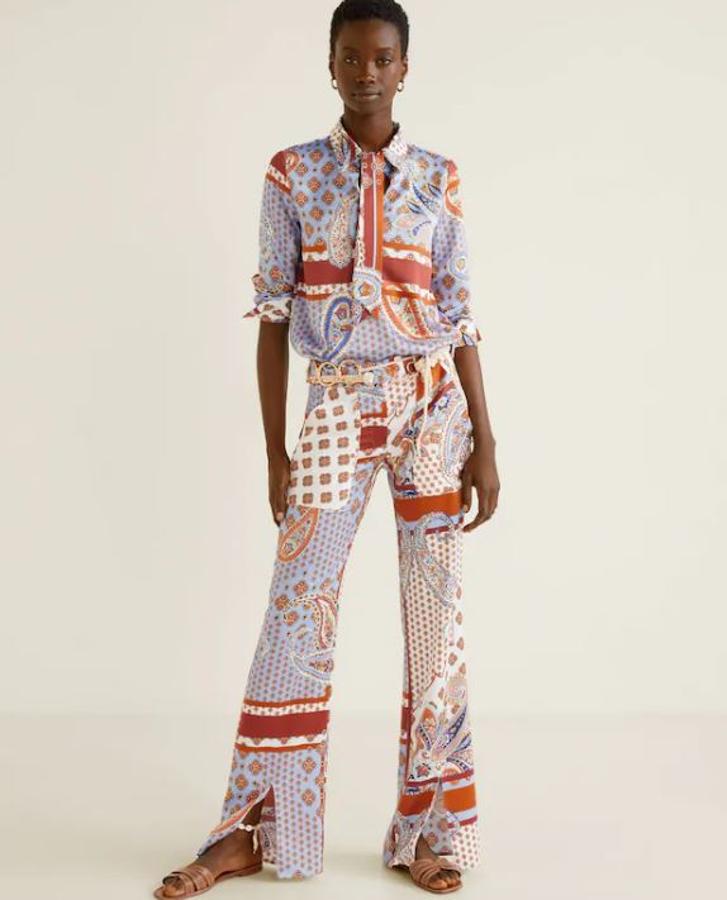 Pantalón de satén estampado de talle alto, de Mango Outlet, (22,99 euros).