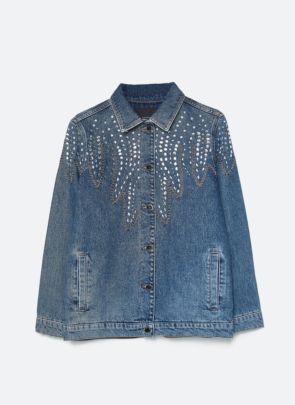 Cazadora tejana con bordados de Uterqüe. (159 euros).