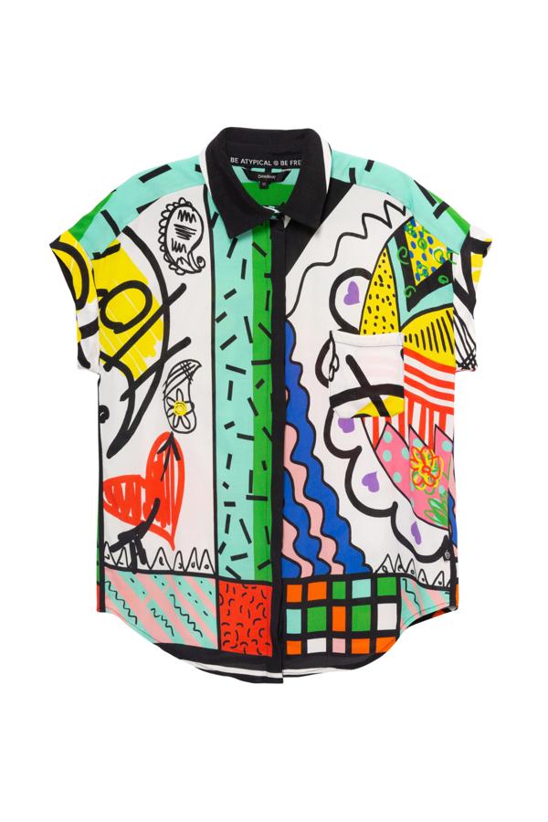 Se va a enamorar al instante de este estampado arty de la camisa  de Desigual . De manga corta y muchos colores, cuando se la ponga no pasará desapercibida.