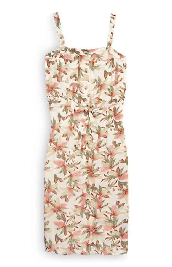 Vestido de corte recto, con botonadura delantera y cinturón, con un estampado tropical súper veraniego, de Primark (18 euros).