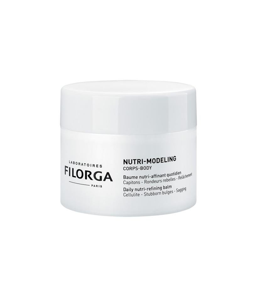 Contiene cafeína para reducir los cúmulos de grasa, colágeno de origen marino para reafirmar, mantecas para nutrir, activos vegetales que refuerzan el push up en los glúteos, aceites de hiedra y babasú que alisan y NCEF, el complejo estrella de la firma, que es un cóctel formulado con 50 activos, que actúa contra todos los signos del envejecimiento.  Nutri-Modeling Bálsamo Nutrirreductor Diario de Filorga  (39,90 €).