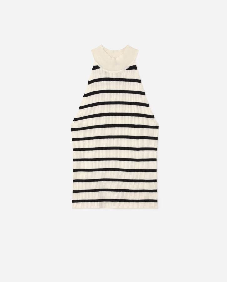 Las rayas favortitas de la tribu de la moda, abanderadas por Chanel. este top de punto con escote halter es un hallazgo, sobre todo porque está rebajado de 12,99 euros a 6,99 euros.