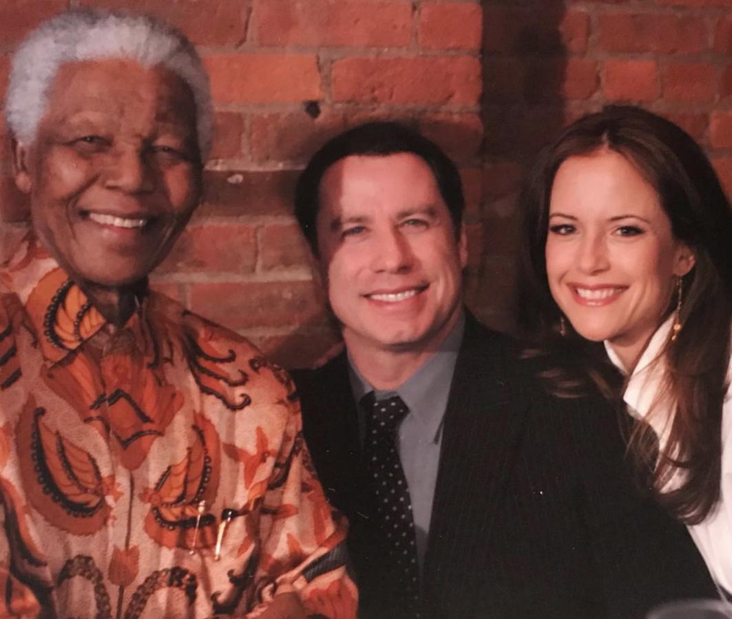 En una foto junto a su marido y Nelson Mandela, a quien admiraba profundamente y a quien visitó en más de una ocasión.