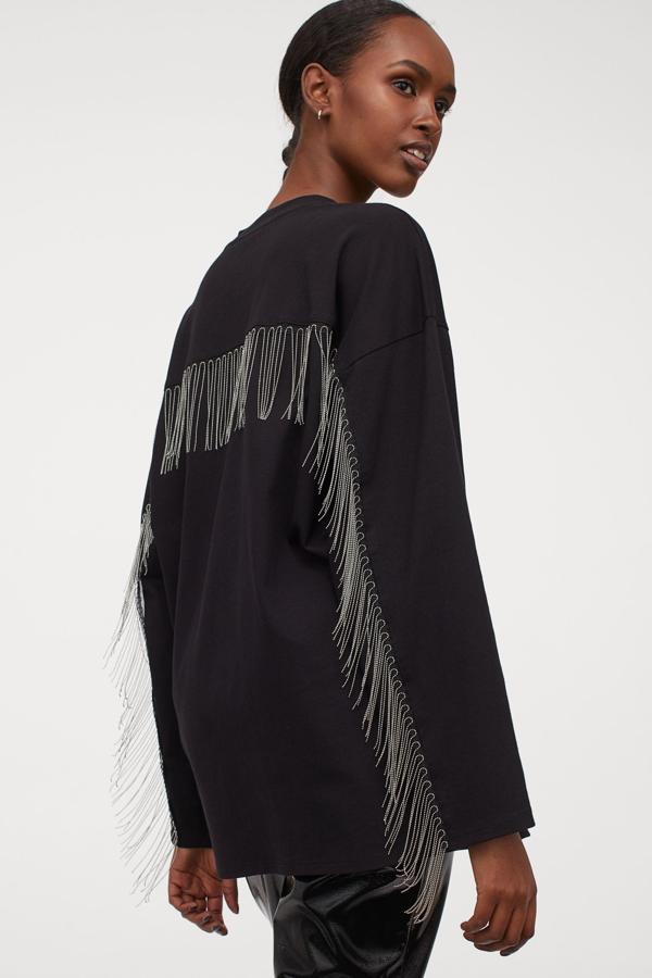 Top con flecos de cadena, de H&M (34,99 €).
