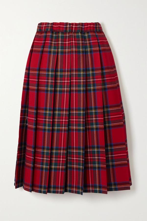 Falda midi plisada con estampado de cuadros escoceses, de Comme des Garçons.