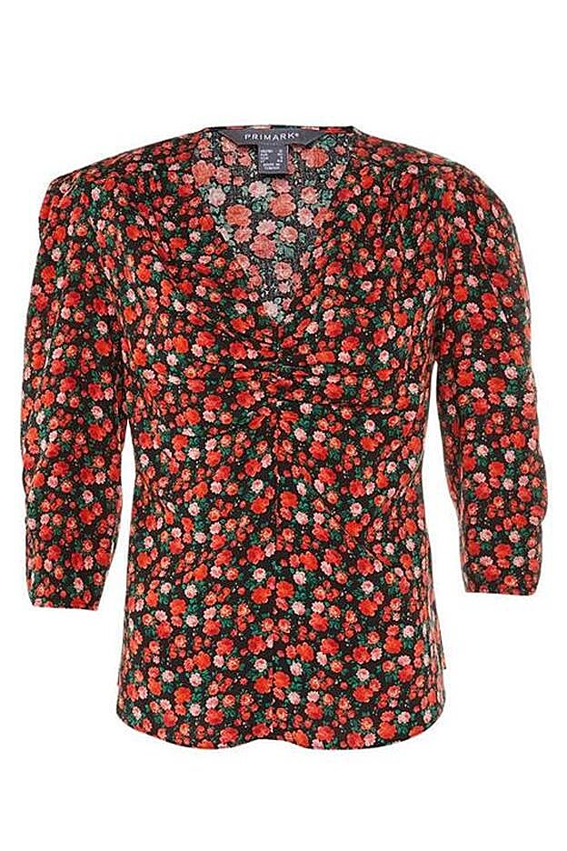 Con un estampado floral de estilo vintage con el rojo como protagonista, este top será uno de tus prendas favoritas esta temporada.