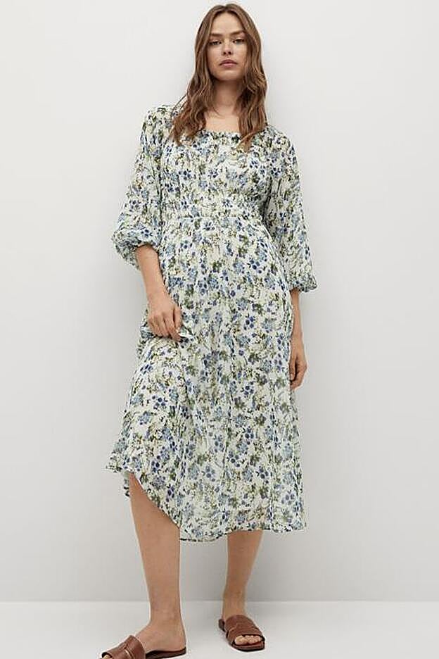 De corte midi y confeccionado en un tejido fluido, este vestido sienta genial y podrás llevarlo en cualquier ocasión.