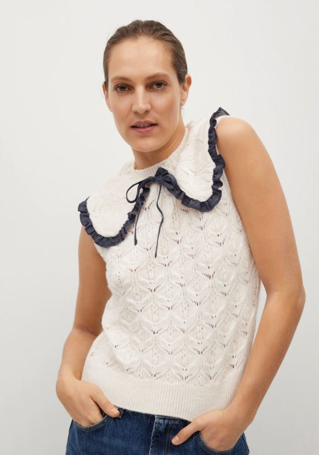 Jersey calado sin mangas y cuello babydoll (19.99 euros en las rebajas mid season de Mango).