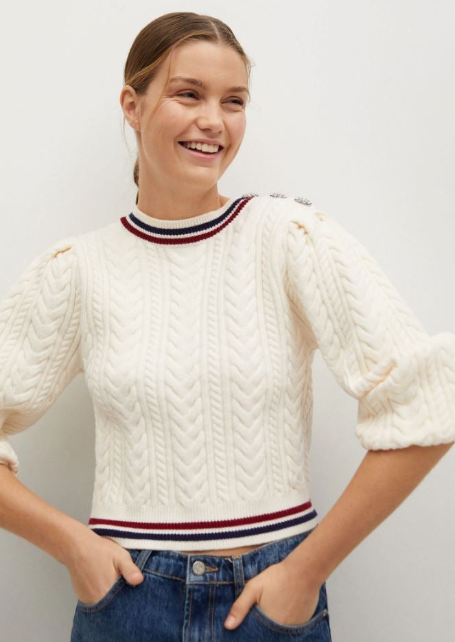 Jersey estilo collage con detalle de botones joya (29.99 euros en las rebajas mid season de Mango).