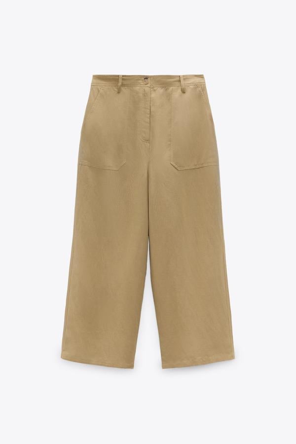 Pantalón en color tabaco con bolsillos delanteros de Zara (29,99 euros)