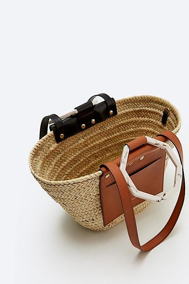 Bolso bicolor en yute y piel de Uterqüe (159 euros)