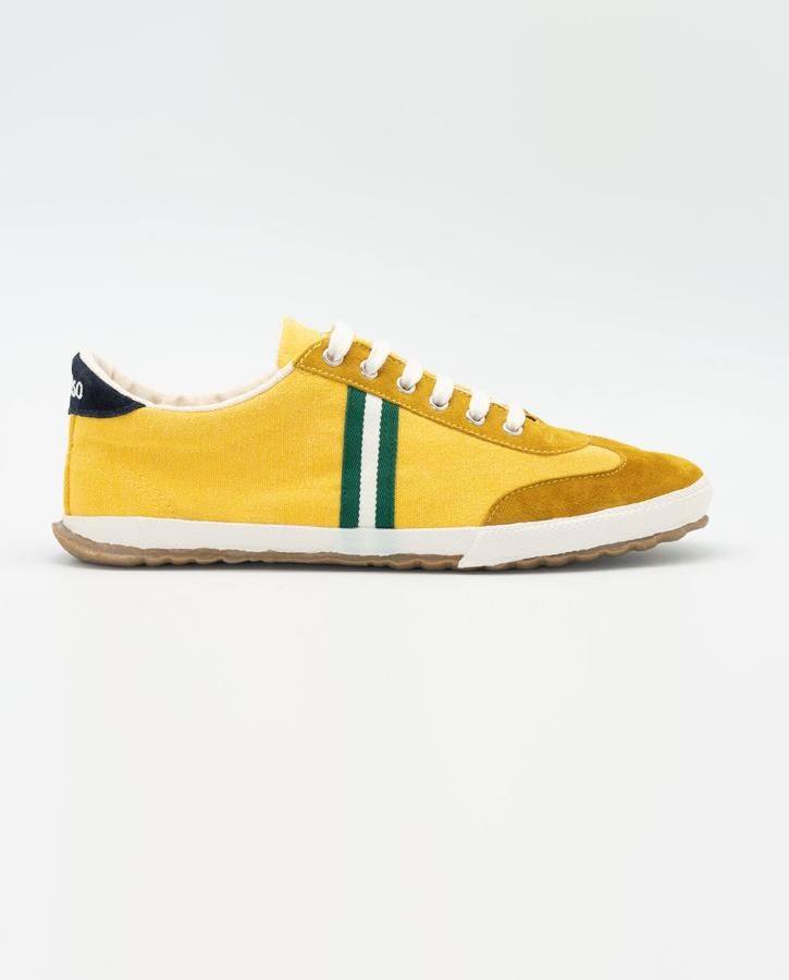 Zapatilla Match Amarillo fabricada en 100% algodón canvas lavado con efecto desgastado y suela de goma vulcanizada, de El Ganso (69,90 €).