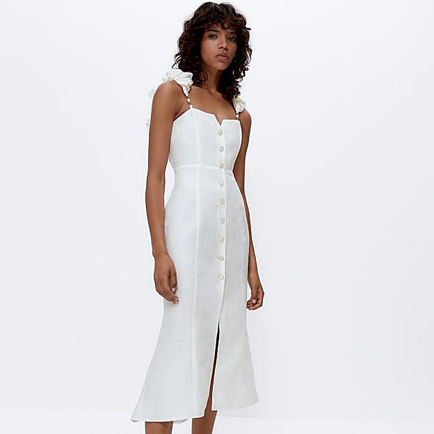 Este vestido blanco destaca por sus originales tirantes con detalle de perlas.