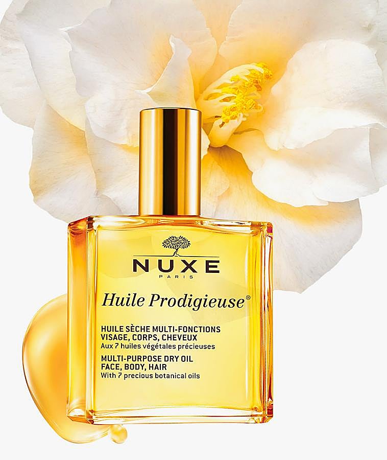 Huile Prodigieuse de Nuxe es un tratamiento mítico con 7 aceites vegetales preciosos y un 98% de ingredientes naturales, ofrece una hidratación duradera en la piel del rostro y del cuerpo y el cabello. Su acción antioxidante, su efecto "escudo anti-contaminación" y su reducción de la aparición de estrías lo convierten en uno de los favoritos (19,90 euros).