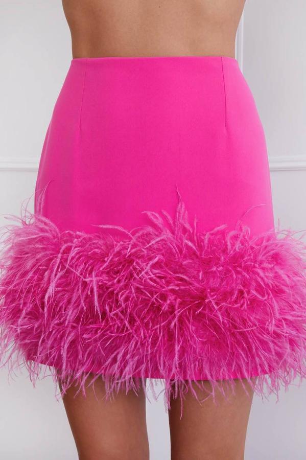 Minifalda 'Mia' de talle alto con adornos de plumas en el bajo, color rosa fucsia.