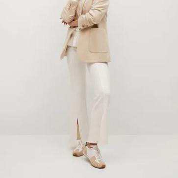 Imagen secundaria 1 - Pantalones split, la tendencia de la temporada que ya arrasa en Zara y Mango, que estiliza muchísimo y que aprueban las famosas