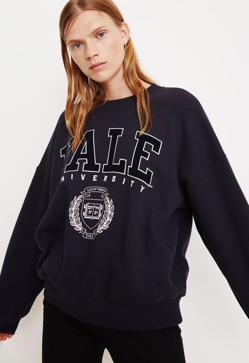 Imagen secundaria 2 - Sudaderas retro, la tendencia que triunfa entre las influencers (y que combinan de maravilla) que ya ha llegado al low cost