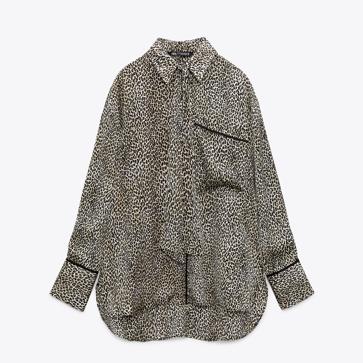 Imagen secundaria 1 - 1. Pantalón ancho con estampado animal de Zara (29,99 euros). 2. Camisa oversize de estilo masculino de Zara (25,99 euros). 3. Mini vestido con volantes de Zara (29,99 euros). 