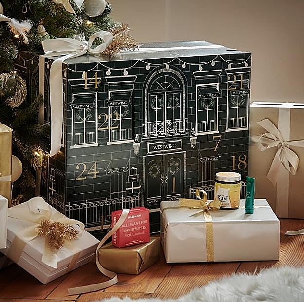 Imagen principal - Puedes encontrar calendarios de Adviento tan bonitos como estos en Westwing (cpv), Amazon (13 euros) y en Zara Home (29.99 euros).