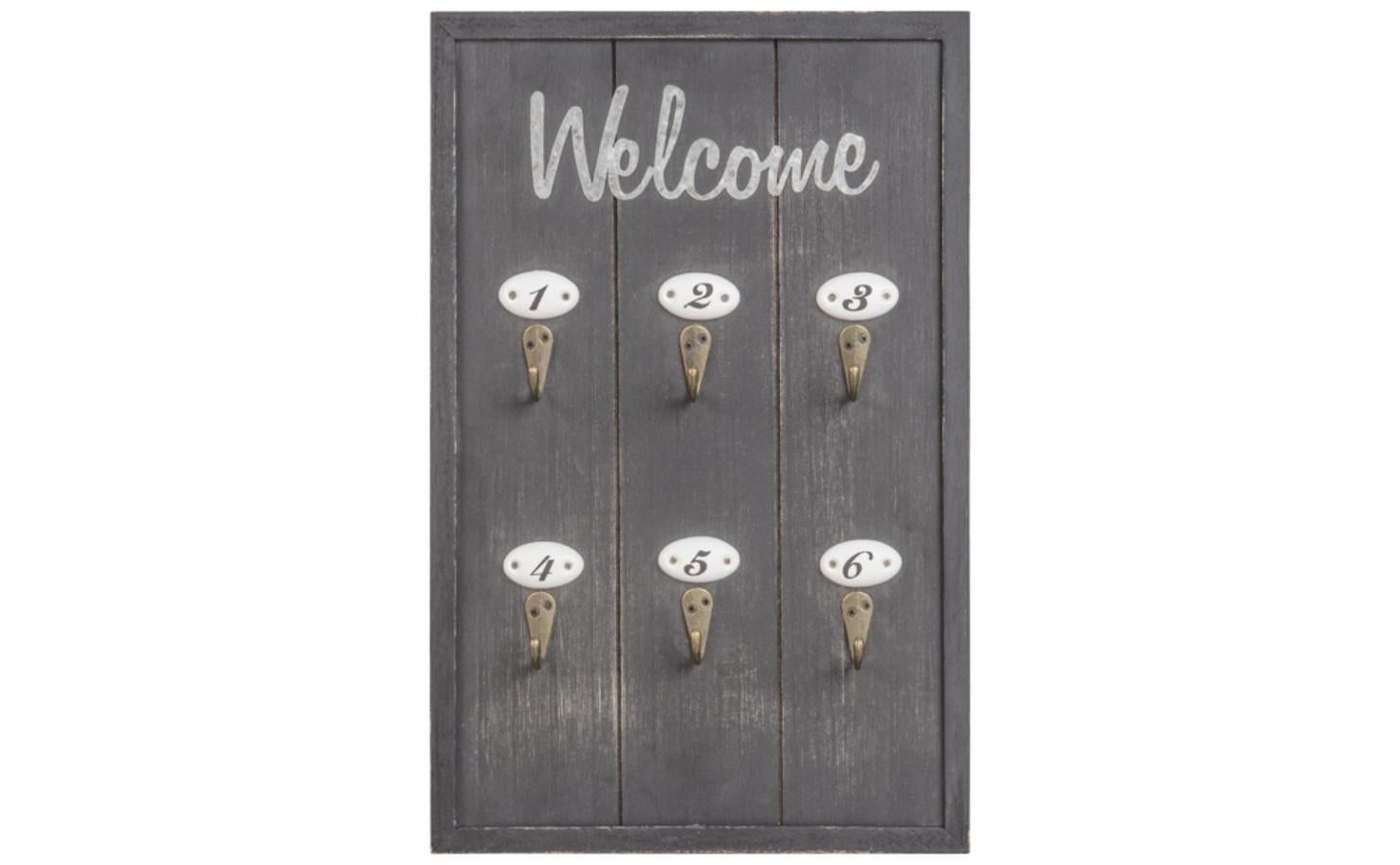 Pieza de madera para colgar las llaves con medidas de 24x38 centímetros. 13,99 euros.