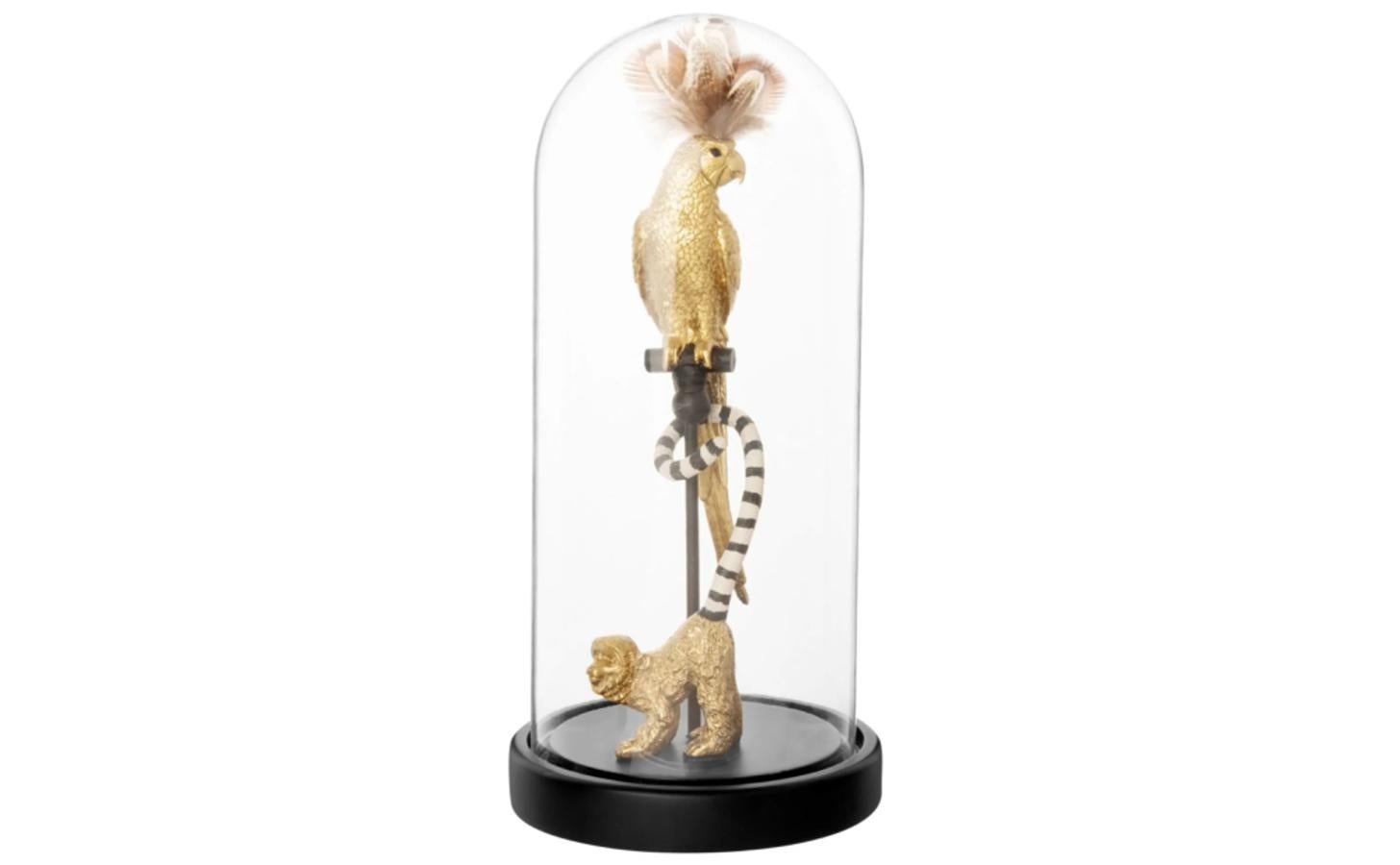 Elaborado con vidrio, polirresina y plumas. Medidas: 24 centímetros de alto por 11 de ancho y profundo. 19,99 euros.