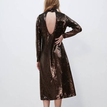 Imagen secundaria 1 - Estos son los vestidos de punto con lentejuelas que mejor sientan para ir cómoda, calentita y estilosa estas fiestas